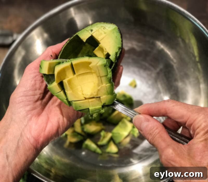 Guacamole Chicken Salad, showing the creamy texture and vibrant green color of the avocado mixed with other ingredients.