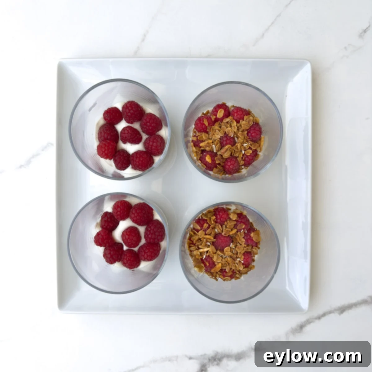 How to make a yogurt parfait, layering ingredients in a glass.