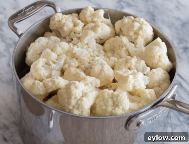 pan of raw cauliflower florets | AFoodCentricLife.com