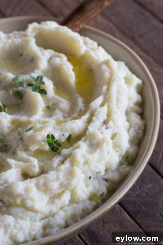bowl of creamy cauliflower puree | AFoodCentricLife.com