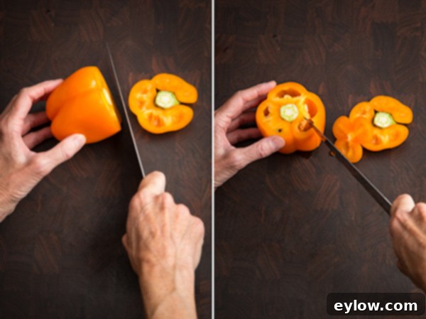 A hand slicing a bell pepper on a cutting board, demonstrating the initial cut.