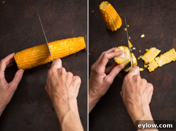 Slicing fresh corn kernels off of the cob into a bowl.