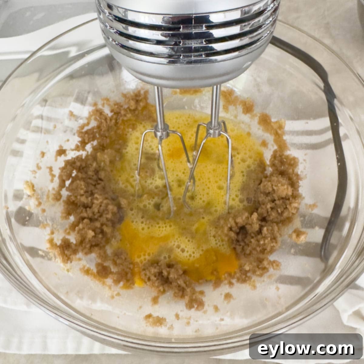 Decadent Fudgy Gluten-Free Chocolate Brownies 6 Creaming room temperature butter and light brown sugar together in a glass bowl using an electric hand mixer until light and fluffy.