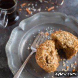 Moist Gluten-Free Dairy-Free Carrot Cake Muffins 6 Gluten-free carrot cake muffins with a hint of coconut, ready to be enjoyed.