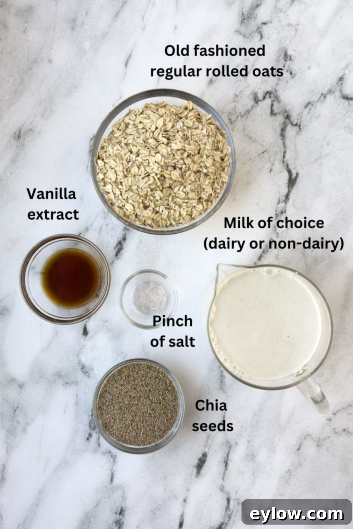 Simple ingredients for overnight oats with chia seeds arranged on a counter.