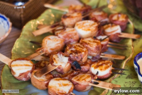 Grilled scallops wrapped with Prosciutto on bamboo skewers.
