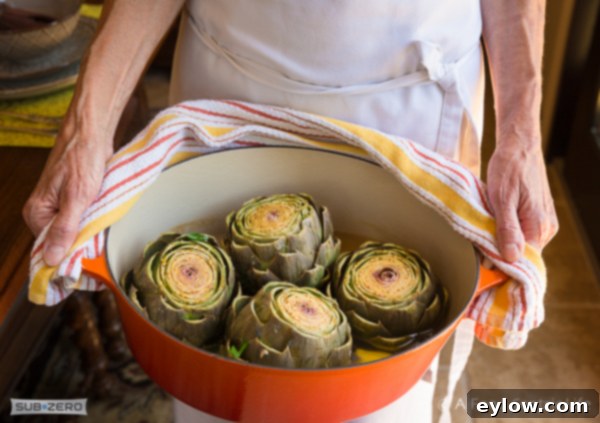 A pot of artichokes ready for steaming. 
