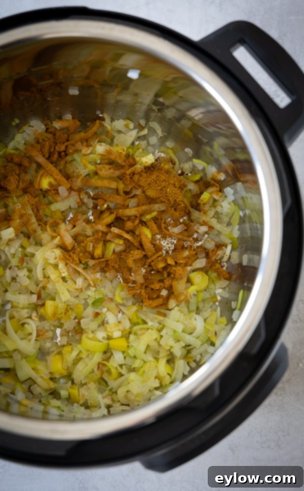 curry cauliflower soup cooking in instant pot | afoodcentriclife.com