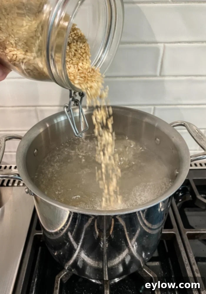 Minimizing Arsenic in Your Rice 3 pouring rice into pot | afoodcentriclife.com
