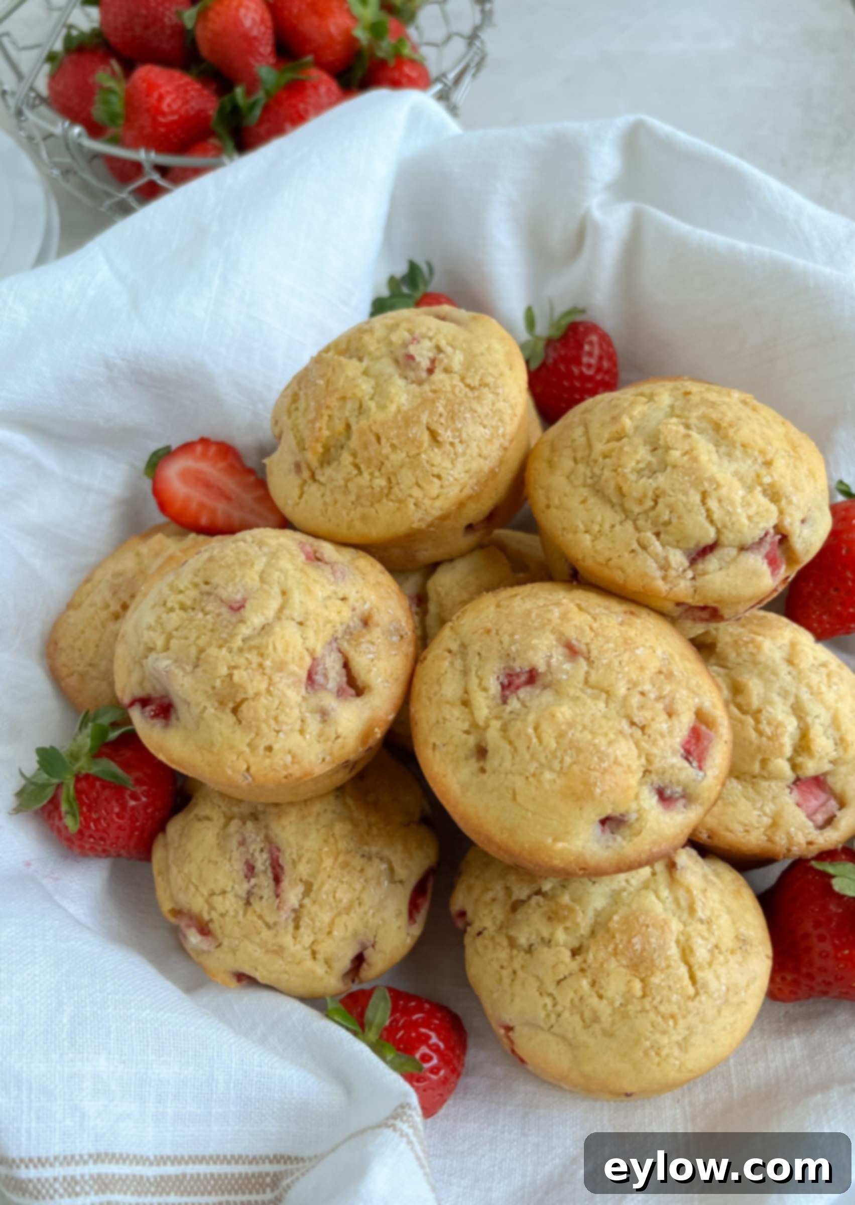 Fluffy Gluten-Free Strawberry Muffins 8 Basket of strawberry muffins ready for the table.