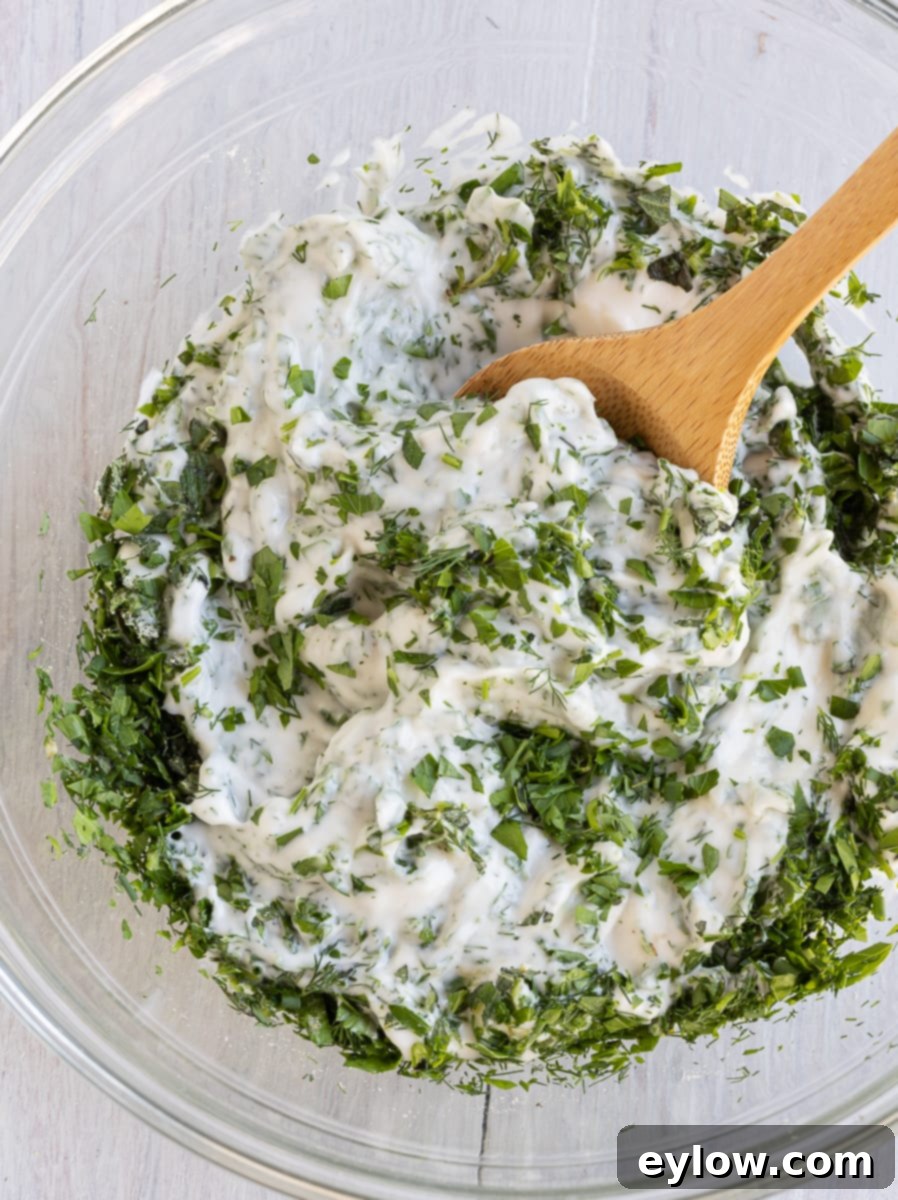 Effortless Green Goddess Dip and Dressing 6 Green Goddess dressing being mixed.