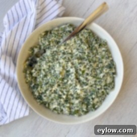 Ricotta cheese spinach filling in a bowl on the counter.