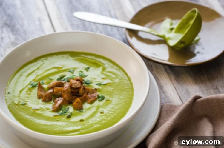 Close up of creamy broccoli soup on the table.