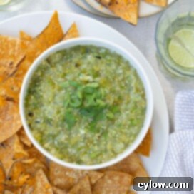 Beautiful chunky green salsa verde with toasted corn chips.