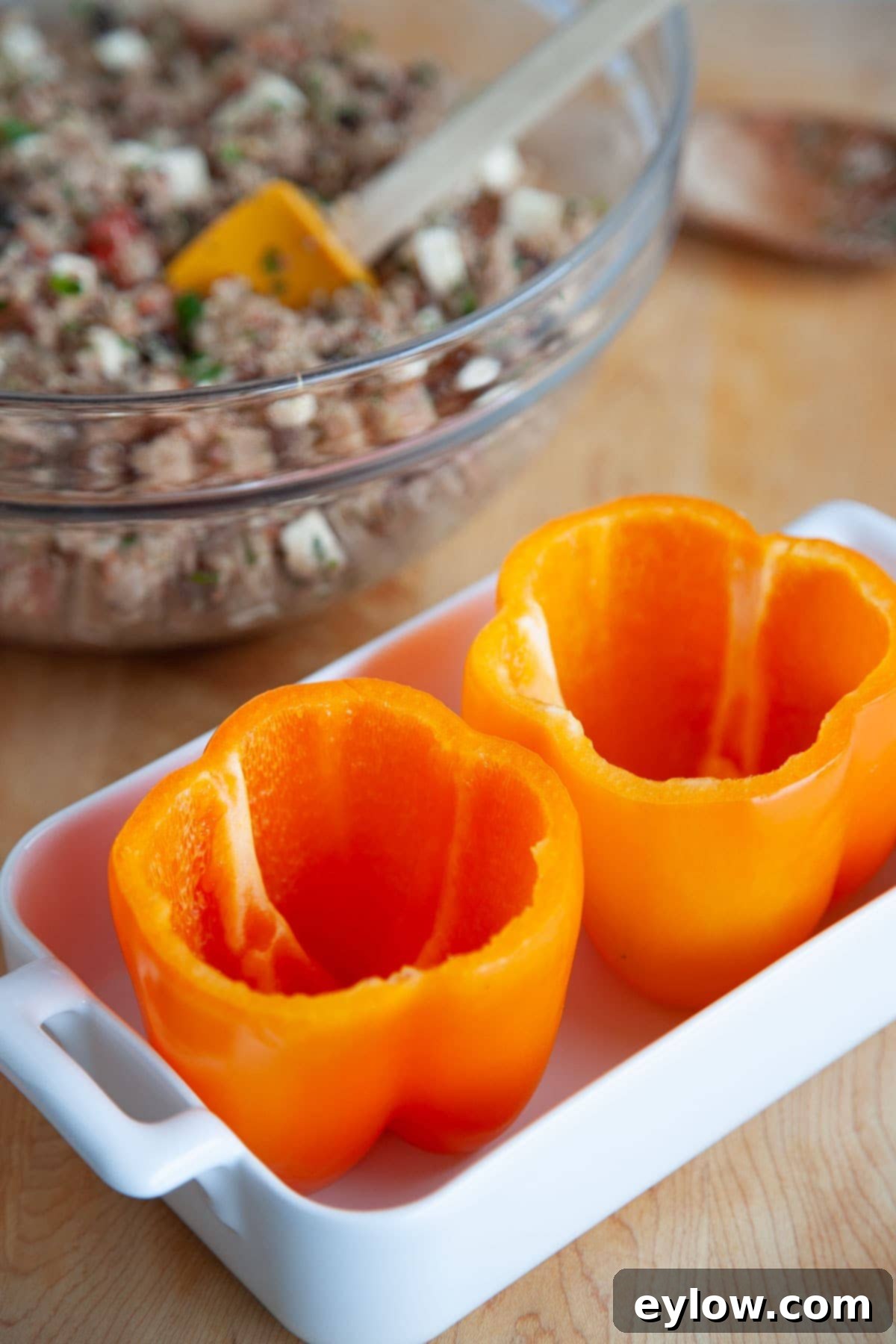 Turkey and Quinoa Stuffed Bell Peppers -4365 Bright orange bell peppers stuffed with ground turkey and a sprinkle of cheese, baked to perfection.