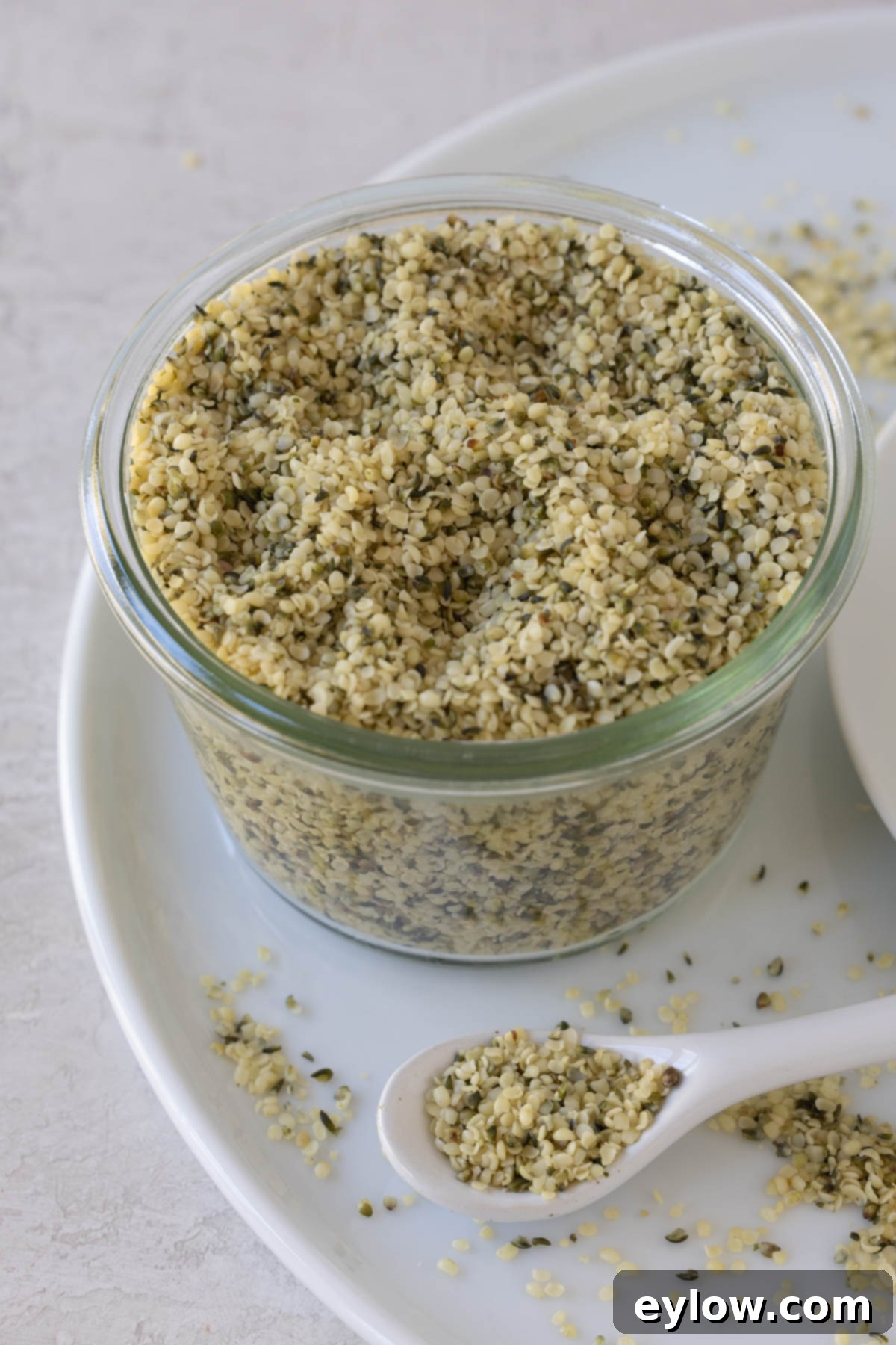 Creamy Homemade Hemp Mylk 4 Raw hulled hemp seeds in a glass jar.