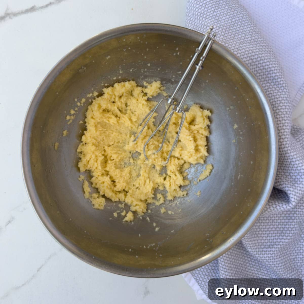 Creaming the butter and sugar together for batter. 