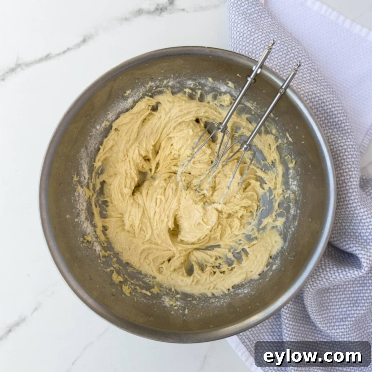 Finished buttery yellow cake batter ready for the baking pan.