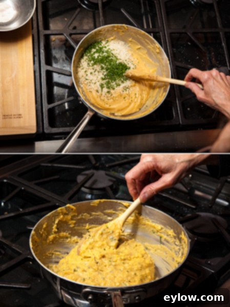 Gougere Cheese Puufs 2256 2257 Finished pate a choux dough in a stainless steel pan with cheese and chives.