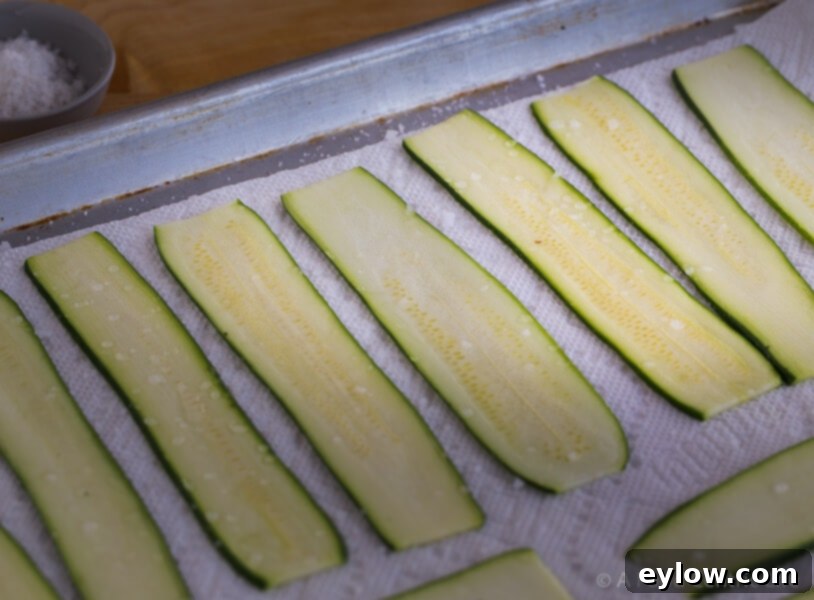 Salting Zucchini Slices for Roll Ups