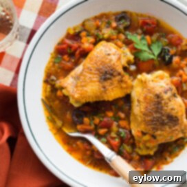 Mediterranean chicken thighs with rich sauce and vegetables, ready to serve