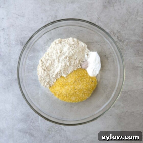 Dry ingredients for the cake in a glass bowl. 