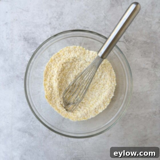 Whisking the dry ingredients together for the cake.
