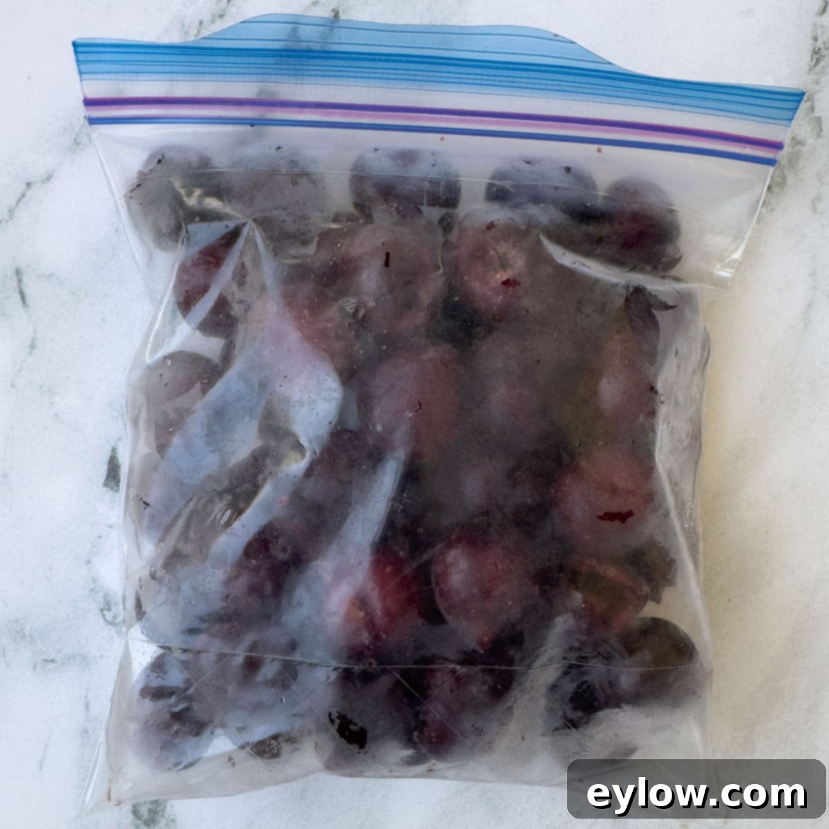 Easy 5-Minute Cherry Smoothie 7 Bagged dark red cherries frozen for long-term storage.