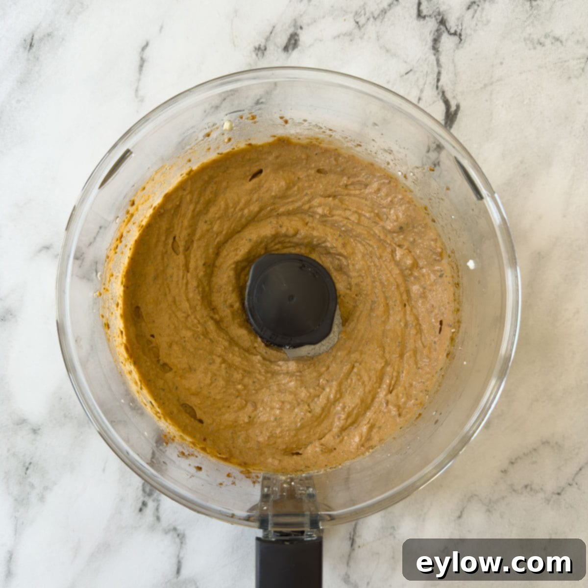 Velvety Sun-Dried Tomato Pesto Pasta 6 Creamy orange tomato pesto sauce, finished and smooth in a food processor workbowl.