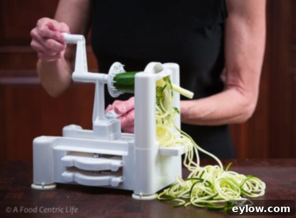 Fresh zucchini noodles ready for cooking.