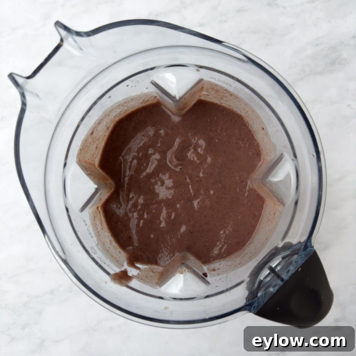 Velvety Black Bean Pumpkin Harvest Soup 4 Pureed black beans in a blender for making soup.