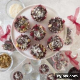 Beautifully arranged chocolate bark bites on a round display plate, ready for serving or gifting.