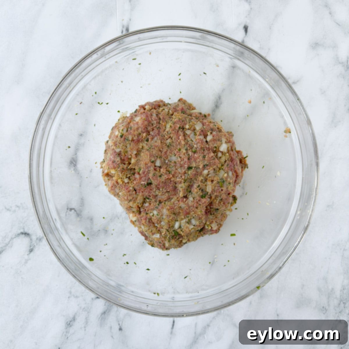 Finished ground beef mix for meatballs ready to portion. 
