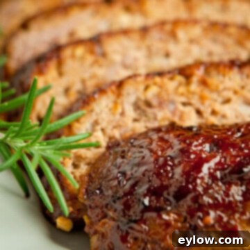 BBQ Glazed Gluten-Free Meatloaf 3 Barbecue Glazed Meatloaf on a platter, ready to serve | AFoodCentricLife.com