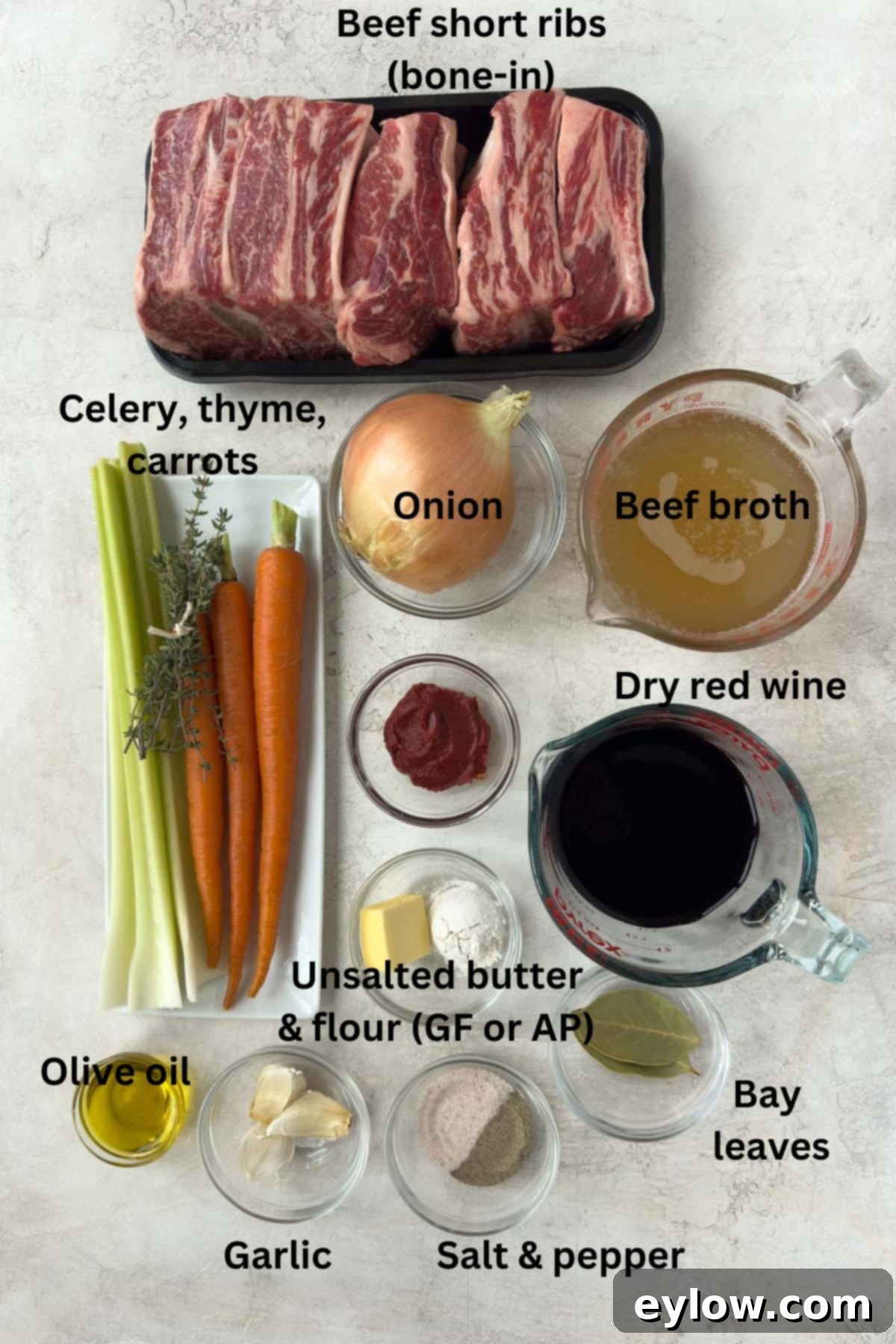 Ingredients for red wine braised beef short ribs on the counter.
