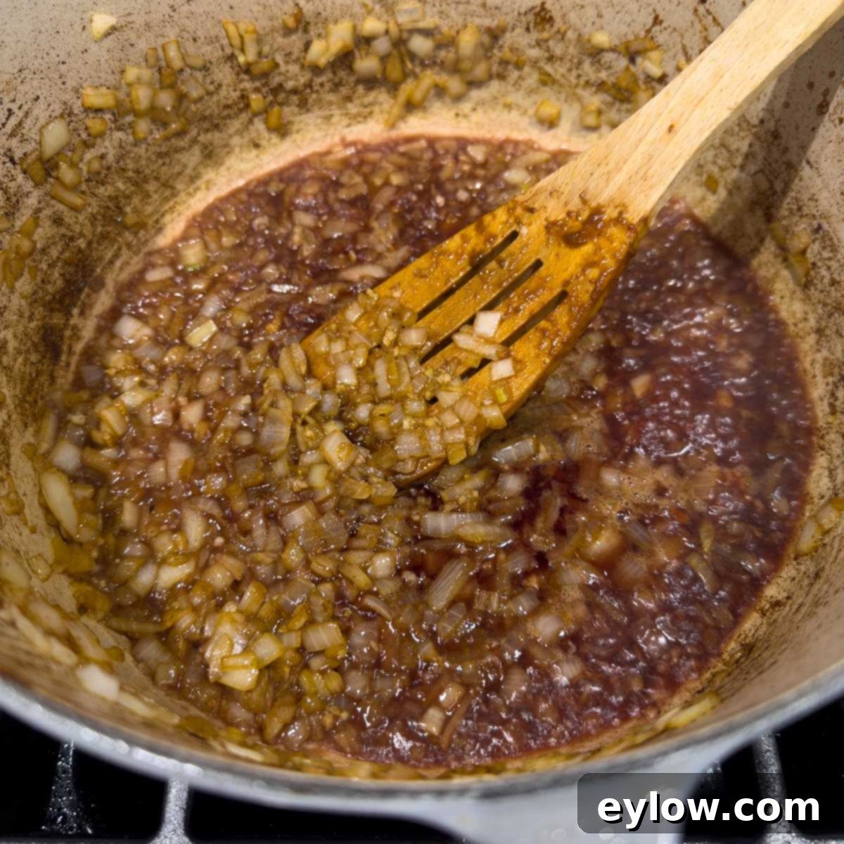 Hearty Beef, Barley & Vegetable Soup 8 Deglazing the pot with red wine after sautéing onions to capture all savory flavors.