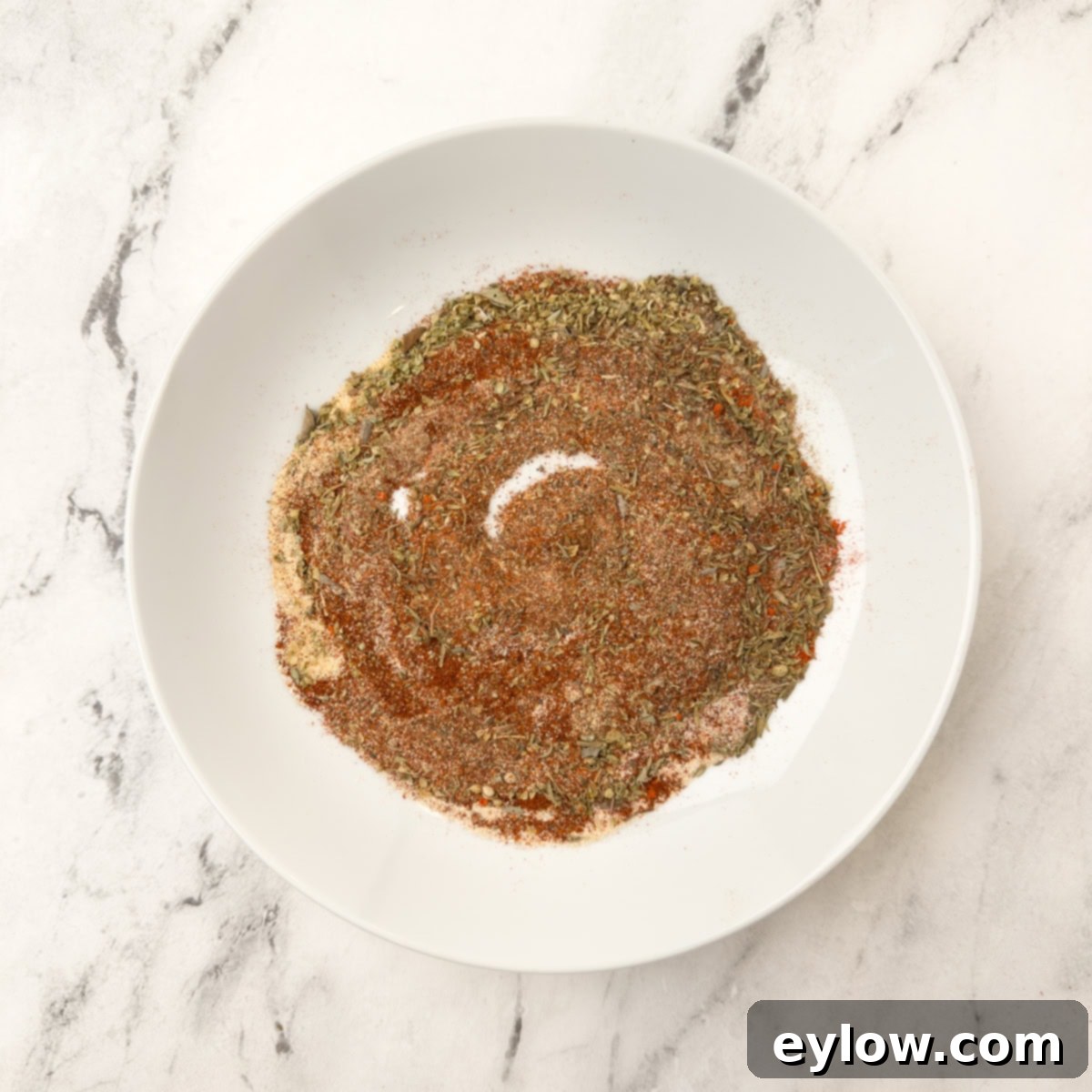 Crispy Blackened Mahi Mahi in the Air Fryer 5 A plate of mixed spices making up Cajun blackening seasoning blend.