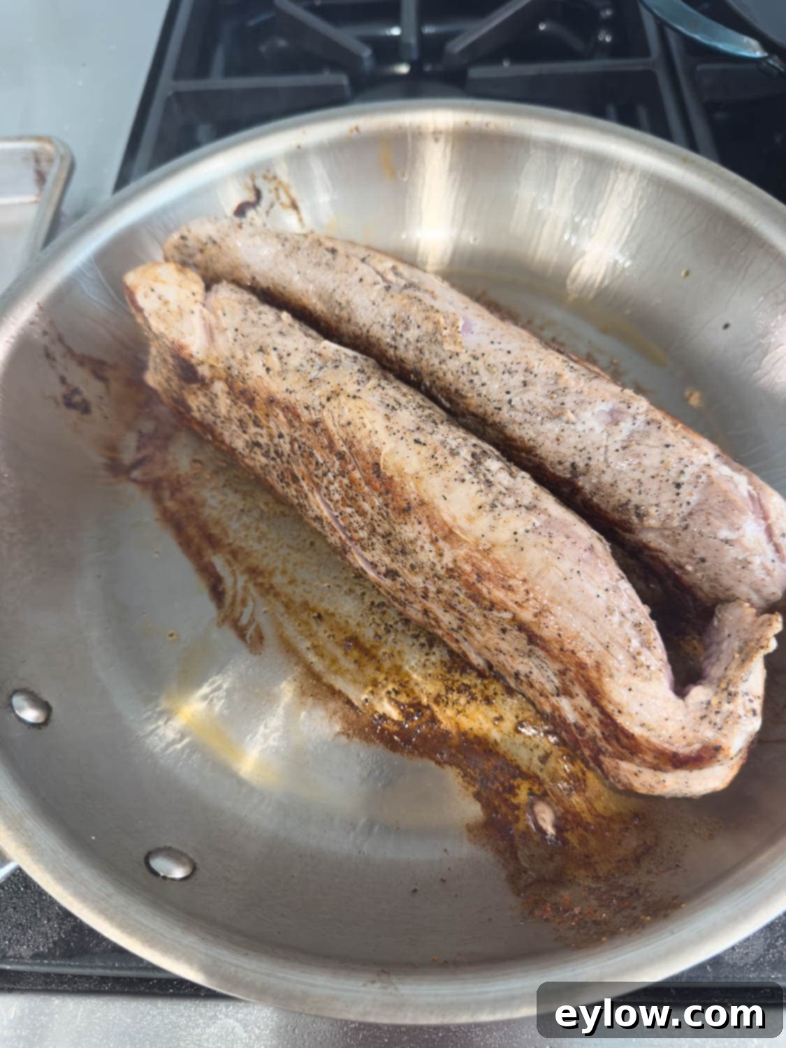 Pellet Grill Smoked Pork Tenderloin 7 Pork tenderloins rolled onto their sides for searing sides.