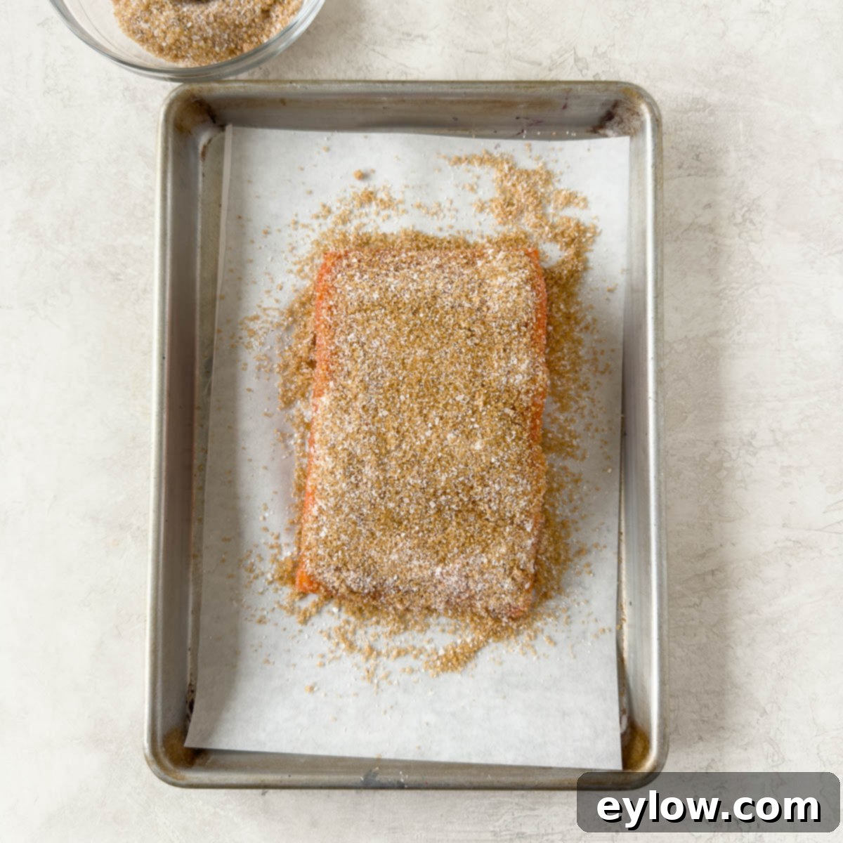 Pellet Grill Smoked Salmon Perfection 5 Salmon fillet covered in a smoking cure with bronw sugar, salt, and spices.