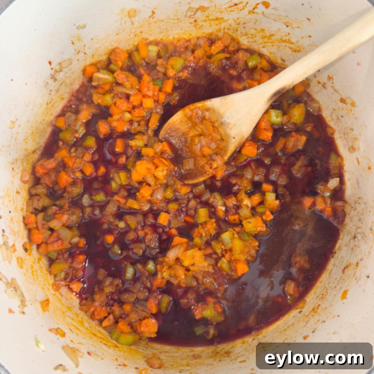 Rich Braised Beef Short Rib Ragu 8 Red wine added to sautéed vegetables to deglaze before next step.