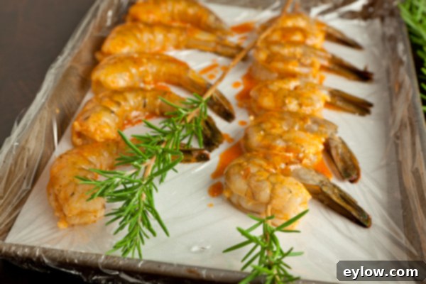 Raw shrimp skewered for the grill.