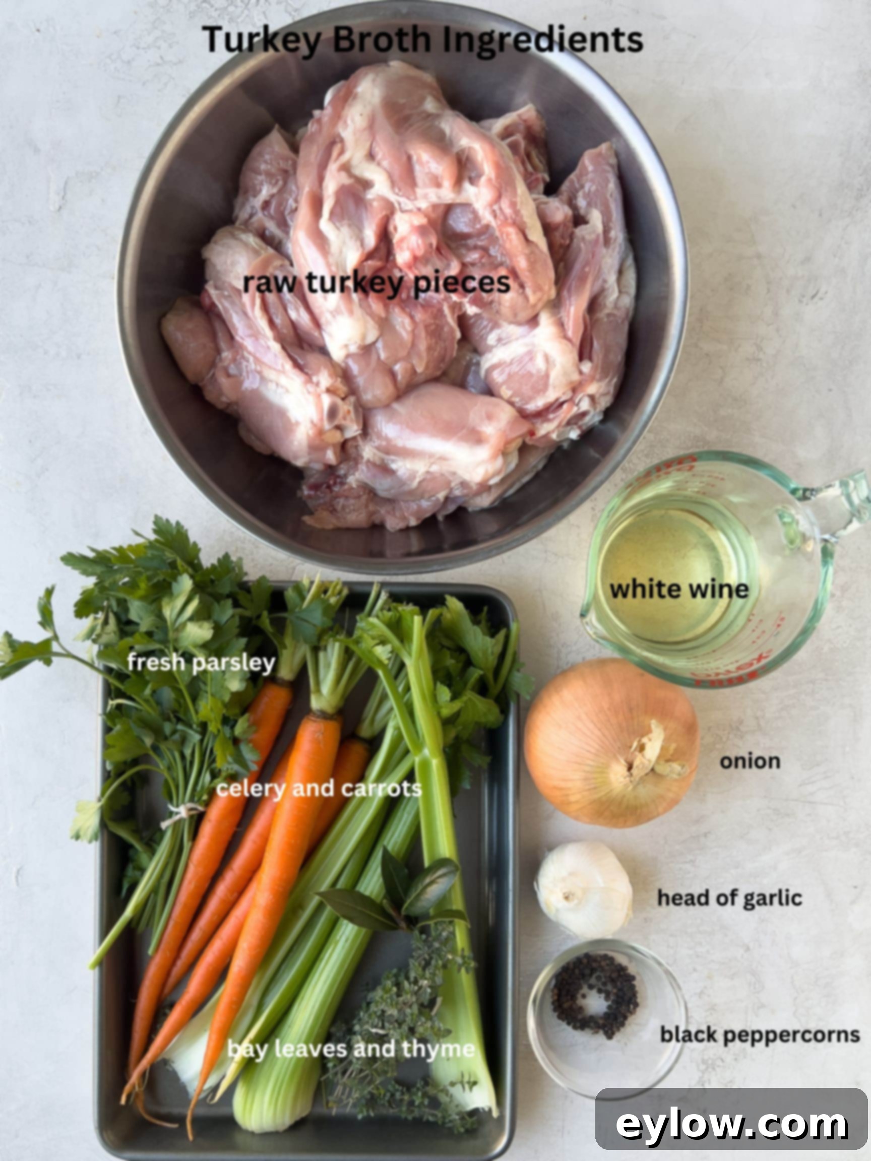Homemade Turkey Stock 3 Fresh turkey broth ingredients including turkey pieces, carrots, celery, and onion.