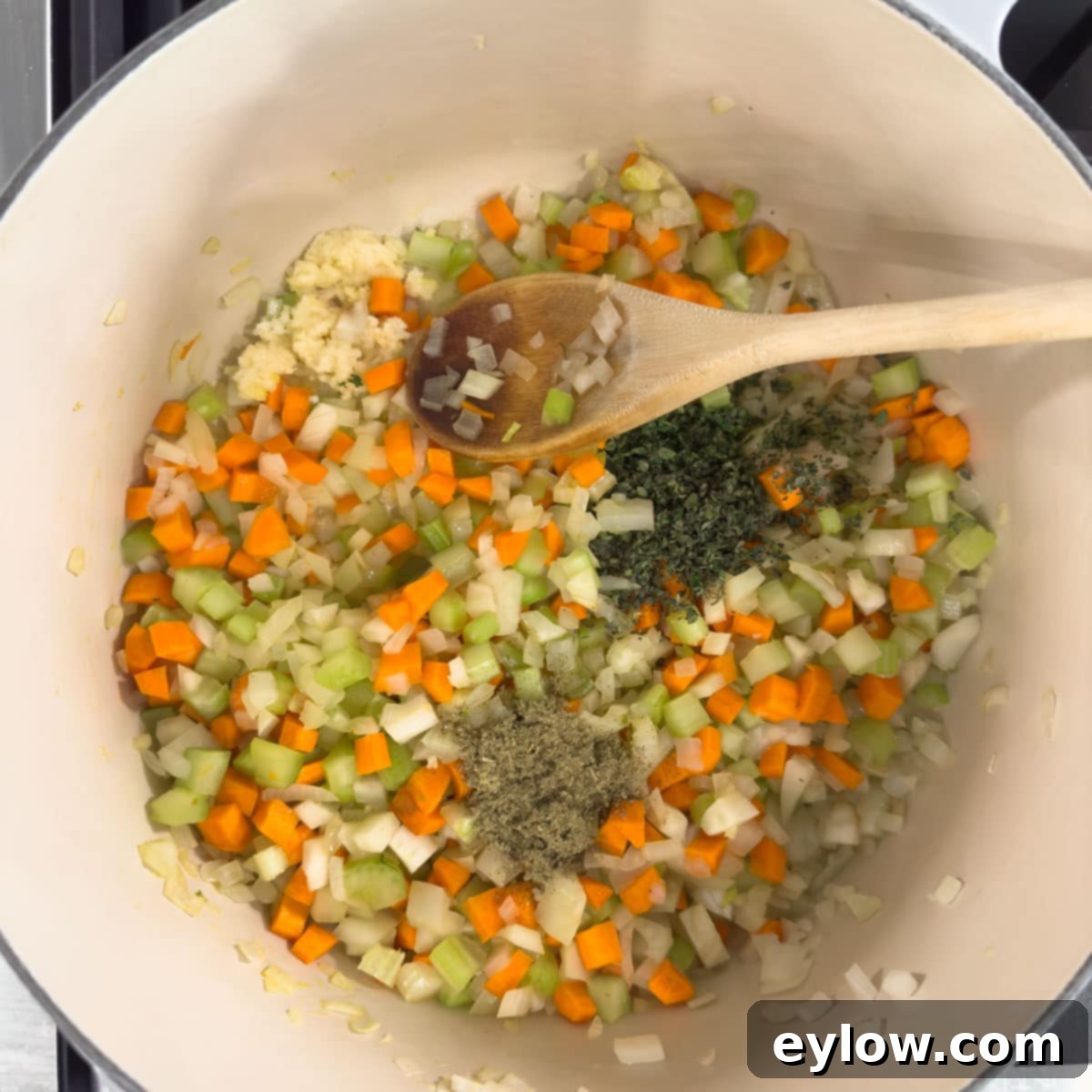 Sautéing vegetables as the base for a soup in a Dutch oven.
