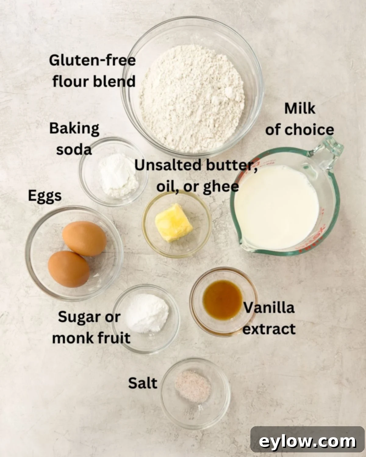 Fluffy Gluten-Free Waffles 3 Ingredients for gluten free waffles recipe in small prep bowls on counter.