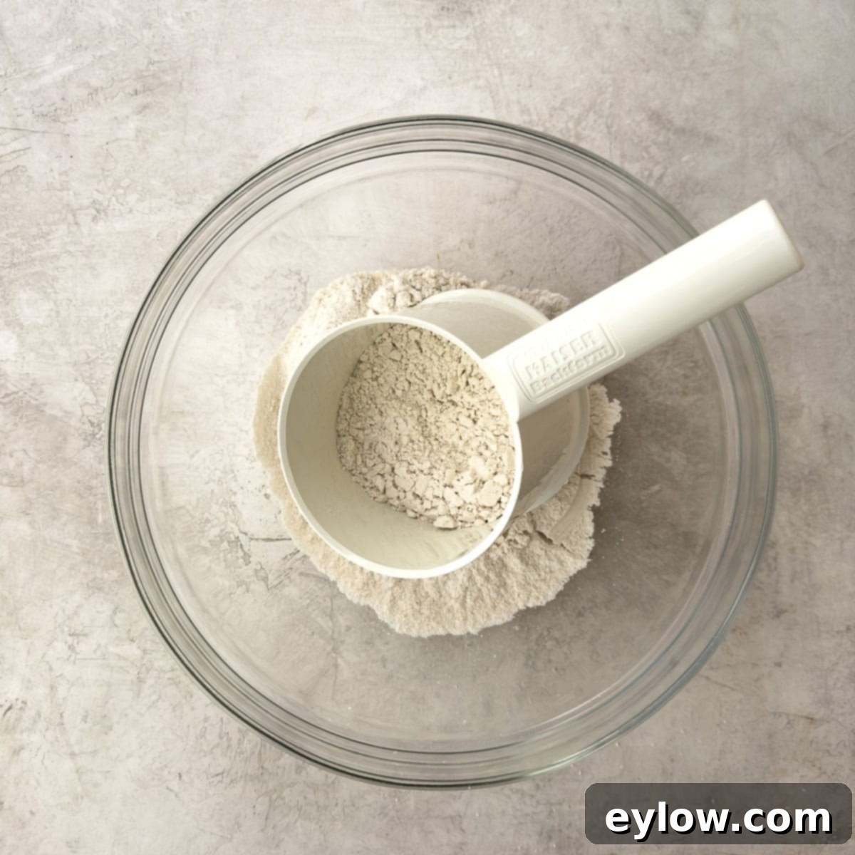 Fluffy Gluten-Free Waffles 4 Sifting dry ingredients for waffles to aerate the flour and remove lumps.