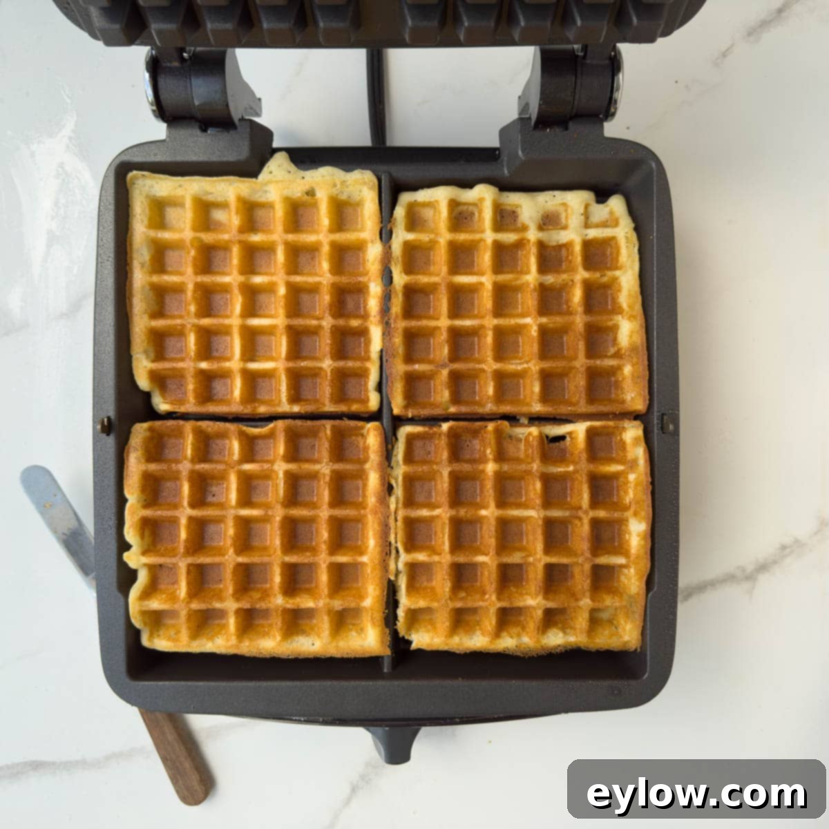 Fluffy Gluten-Free Waffles 9 Golden light finished waffles ready for the table.