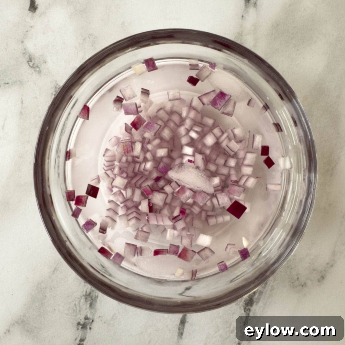 Crisp Cucumber Dill Feta Medley 6 Chopped red onions in ice water to temper their heat.