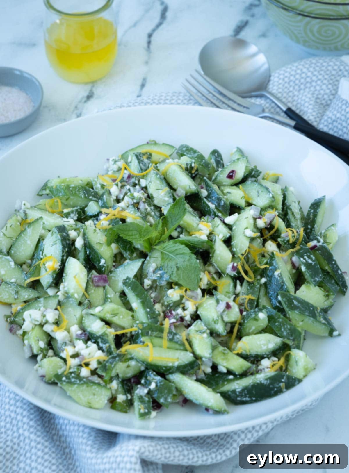 Crisp Cucumber Dill Feta Medley 10 Cucumber and dill salad with lemon zest and mint leave with dill and feta cheese.