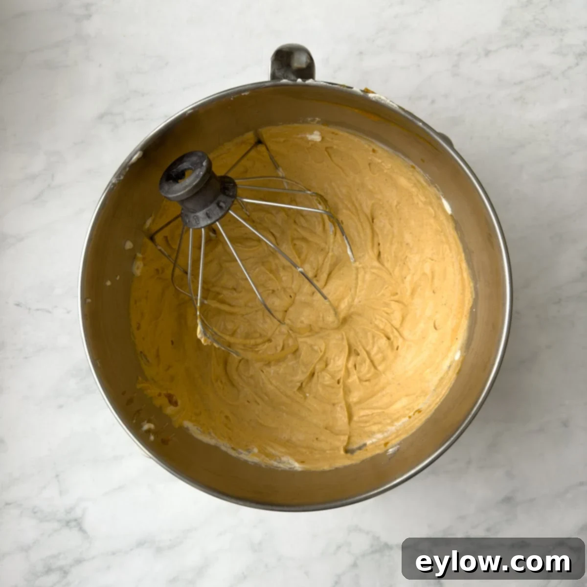 Velvet Pumpkin Mousse No-Bake Treat 11 Gently folding together whipped cream and the chilled pumpkin mixture to create the mousse.