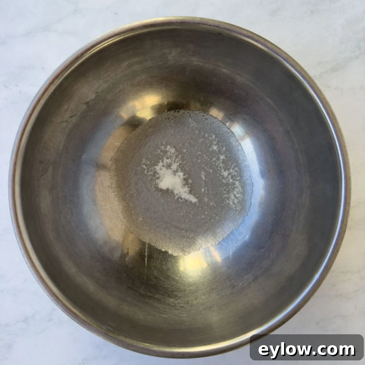 Velvet Pumpkin Mousse No-Bake Treat 4 Softening gelatin with water in a stainless steel bowl for pumpkin mousse.